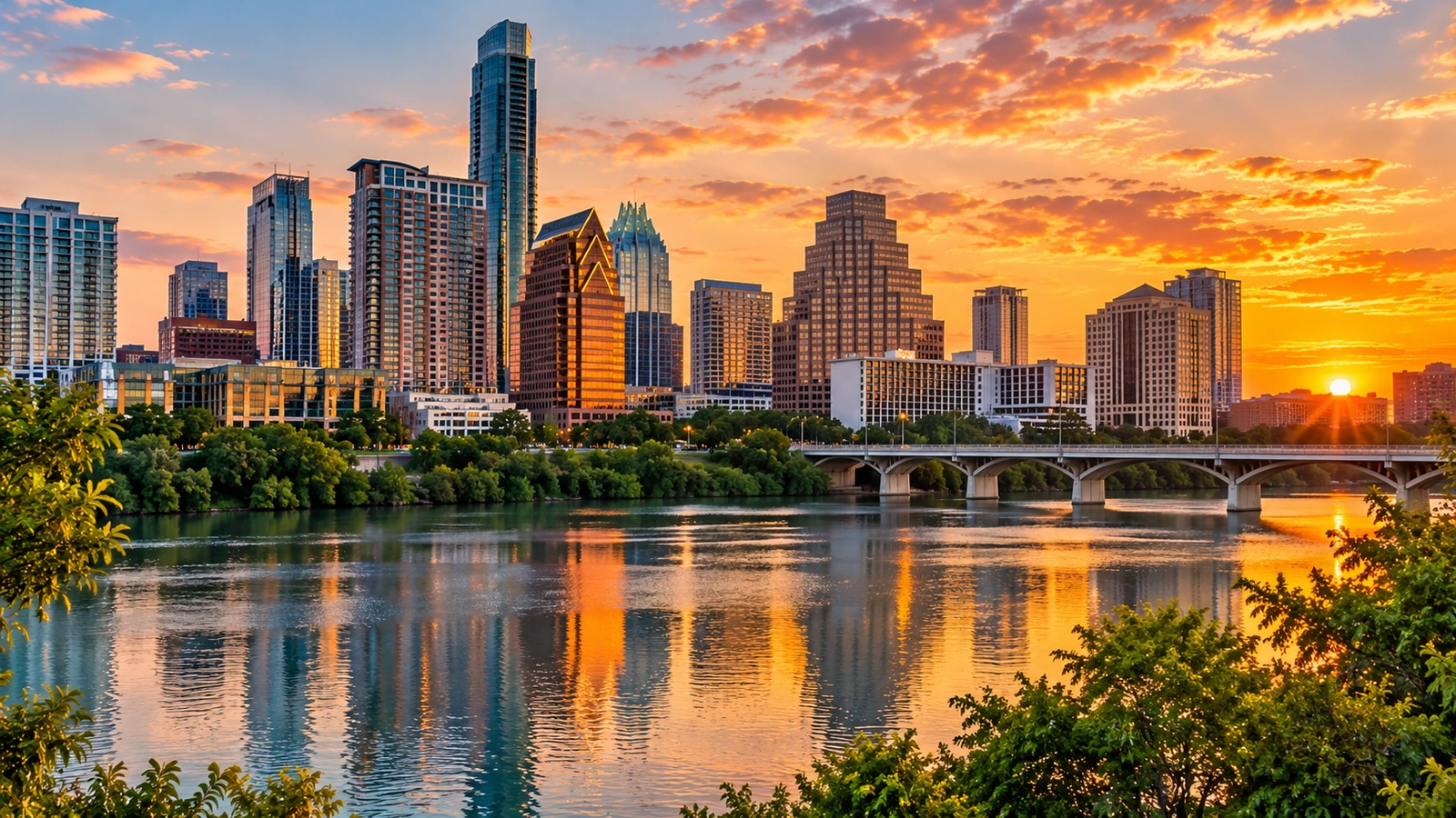 Austin skyline reflected on the Colorado River at sunset